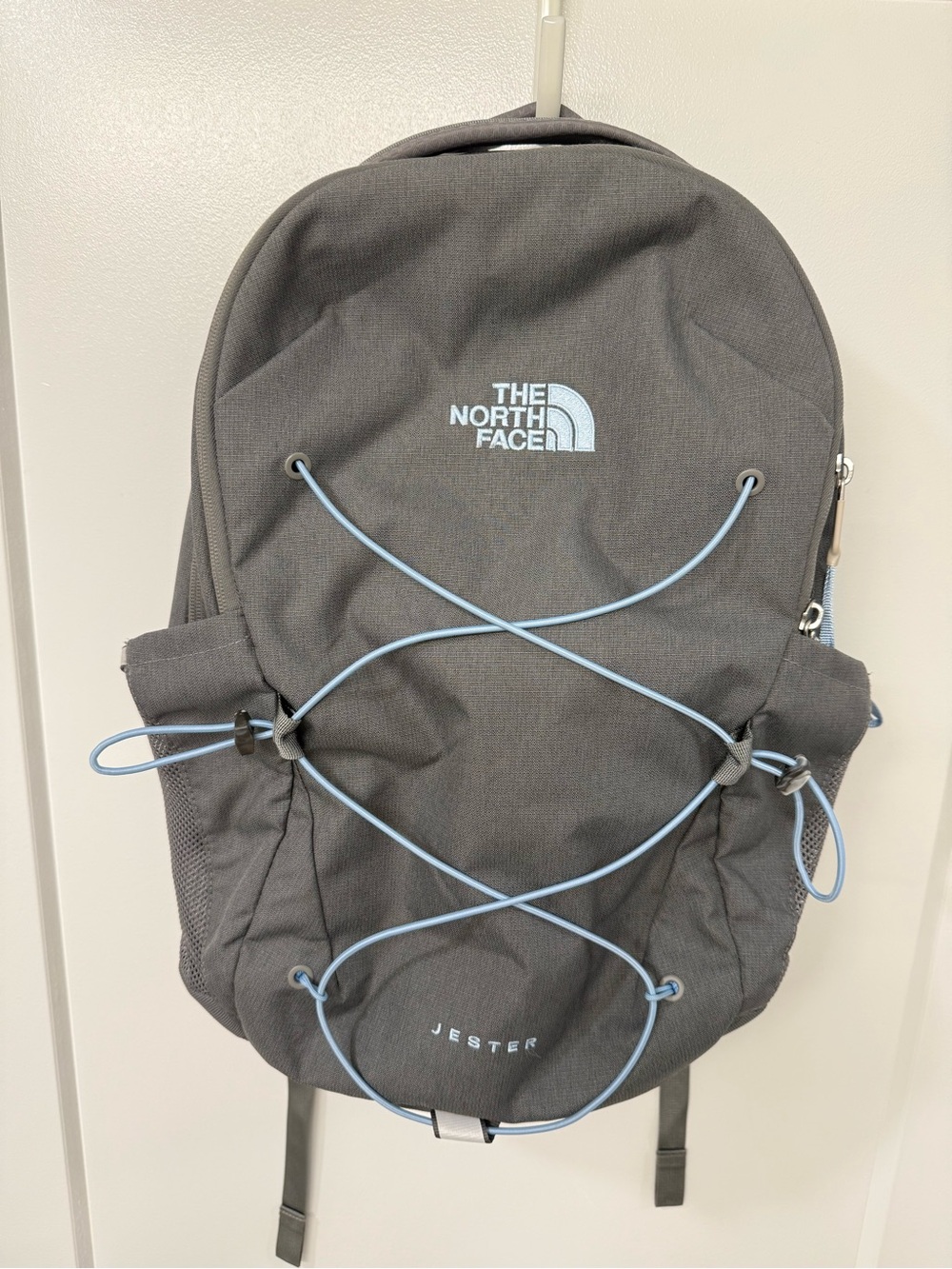 The North Face Jester Backpack in Gray with Light Blue Accents